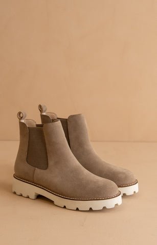 Chelsea boot with a chunky heel with elastic ankle sides for easy off and on and faux light brown suede shoe. 