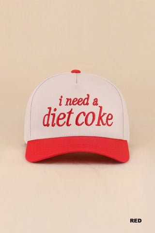 playful baseball style cap in red that says "i need a diet coke" red bill and tan cap