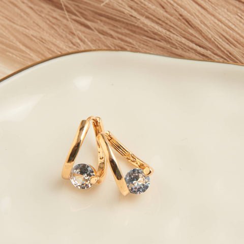 Dainty cubic zirconia gold earrings. 