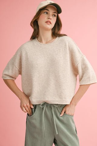 Very soft oatmeal color crop-waisted, oversized shoulder light weight sweater
